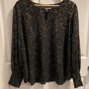 C. EST 1946 blouse
